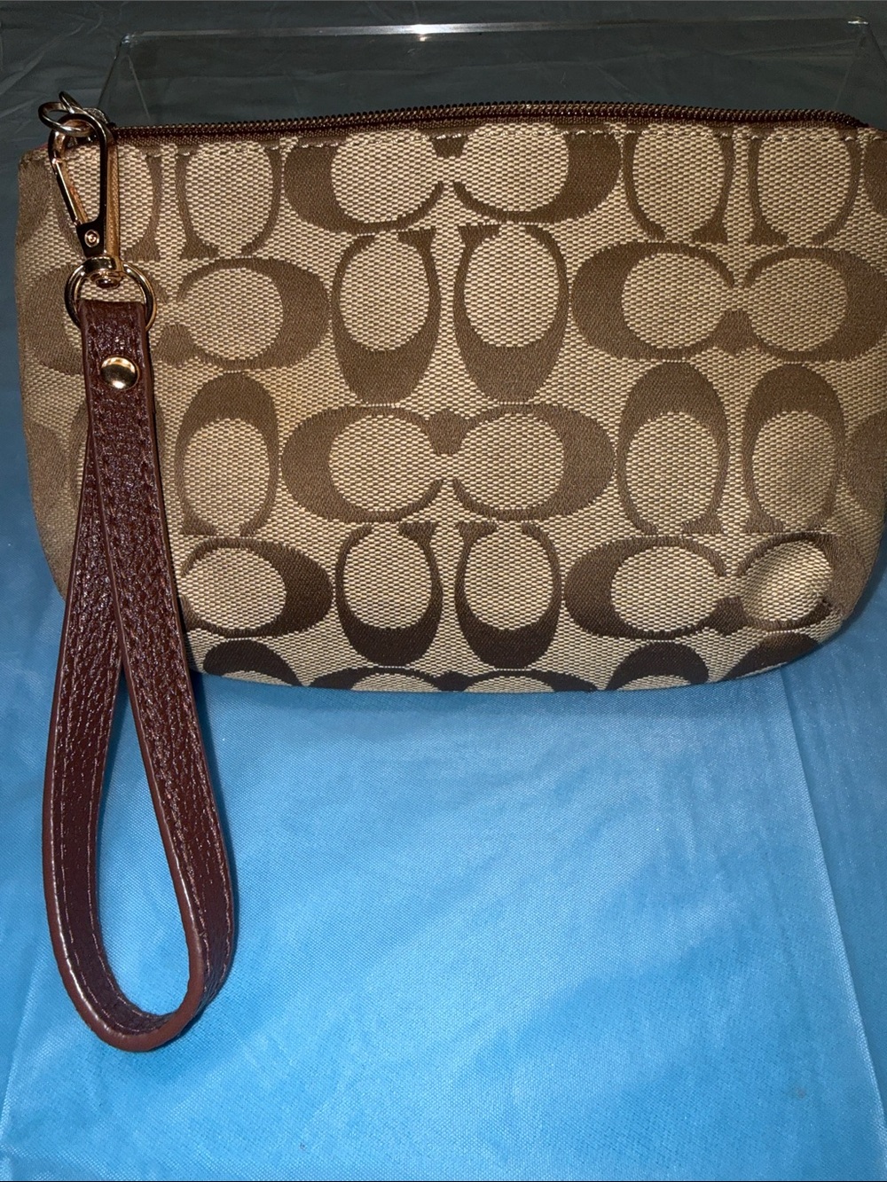 Coach Tan Signature Wristlet with Brown Trim and Coral Accent and key charm - Picture 6 of 6